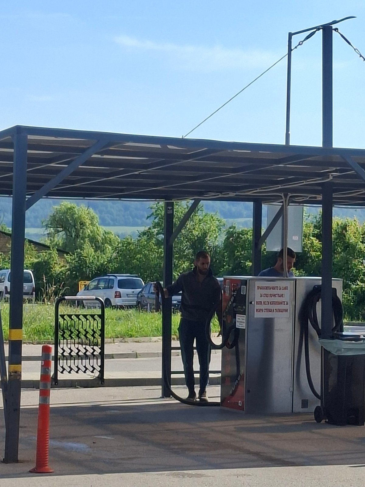 Gas station refueling and garage scenes documented same location