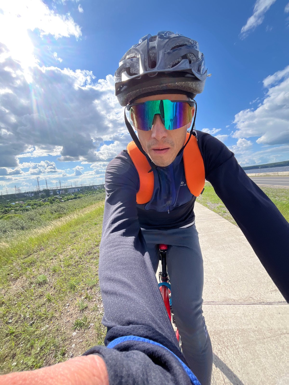 Cyclist observed on waterfront route in Chaikovsky, Russia