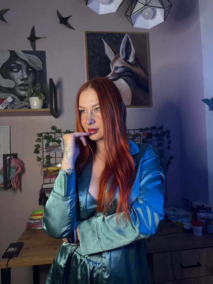 Red-haired woman photographed during home workout session in Russia