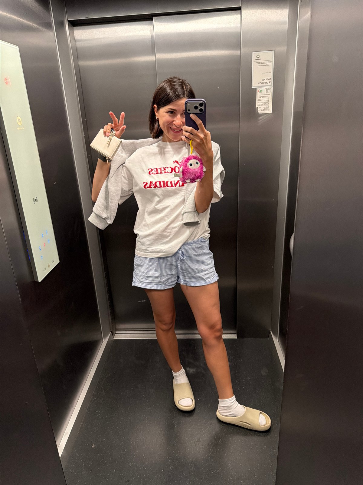 Woman takes elevator selfies in Budva, Montenegro