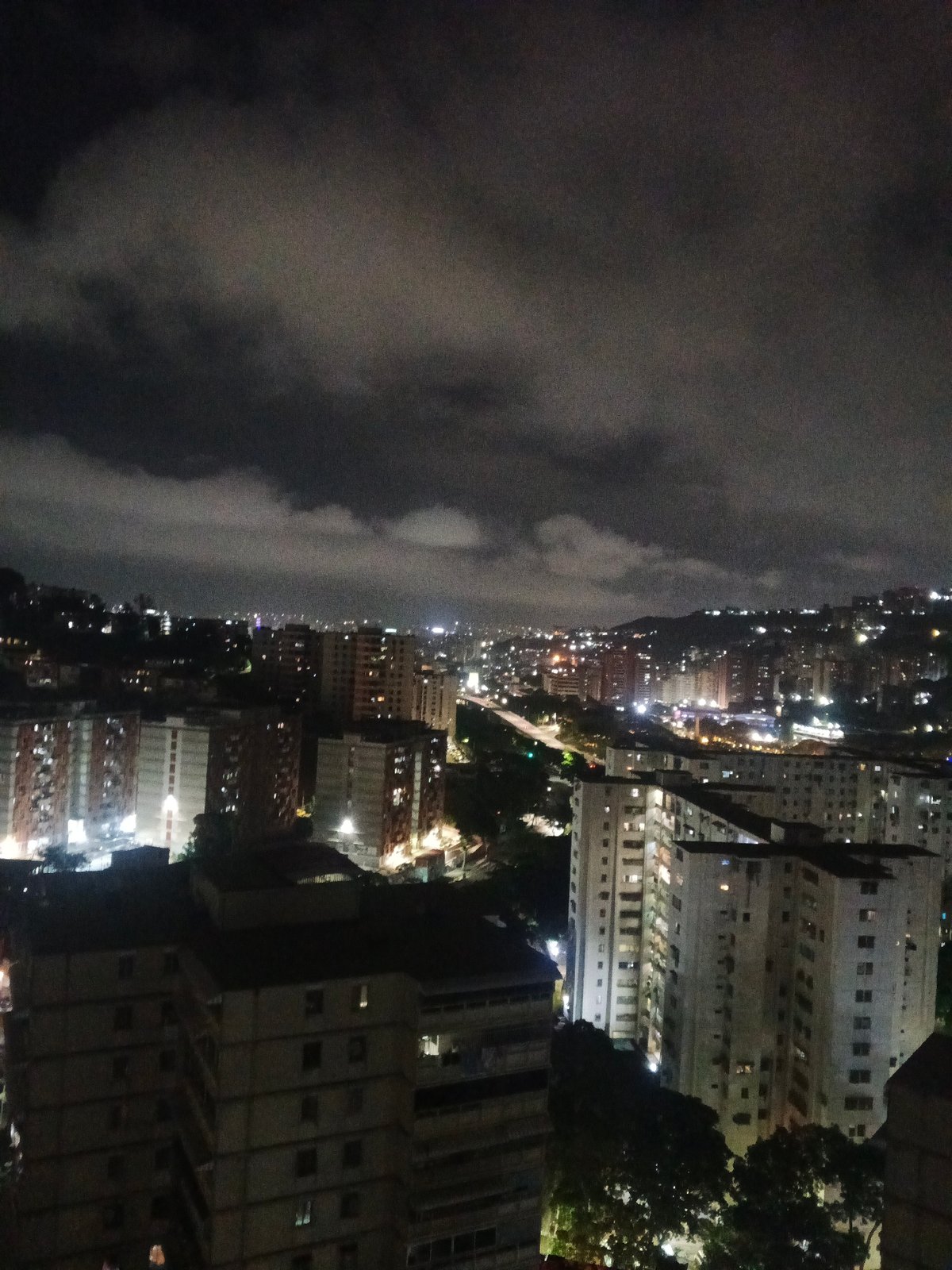 Nighttime Caracas cityscape and domestic moments captured early morning