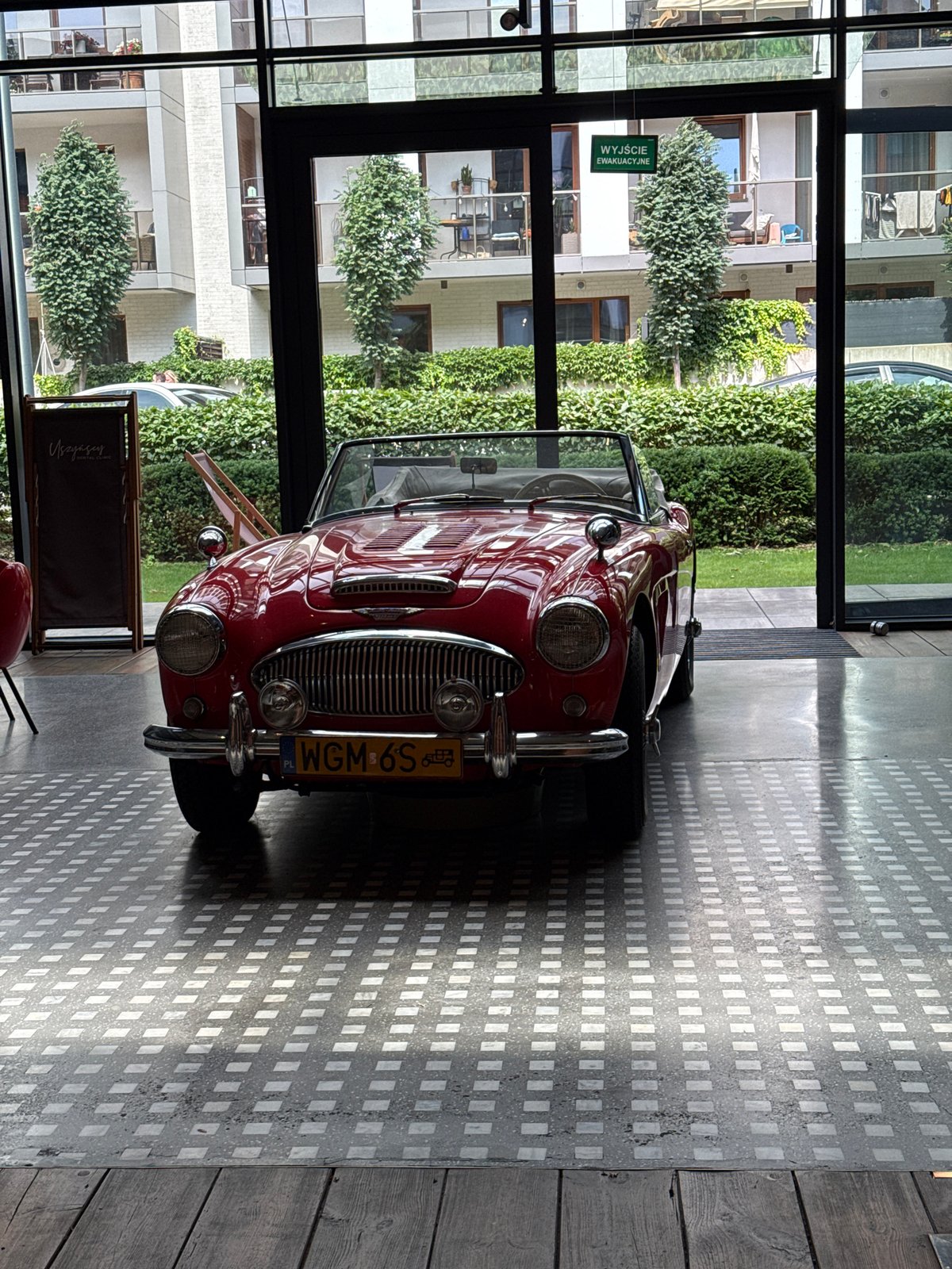 Vintage convertible and piano in a Warsaw indoor venue