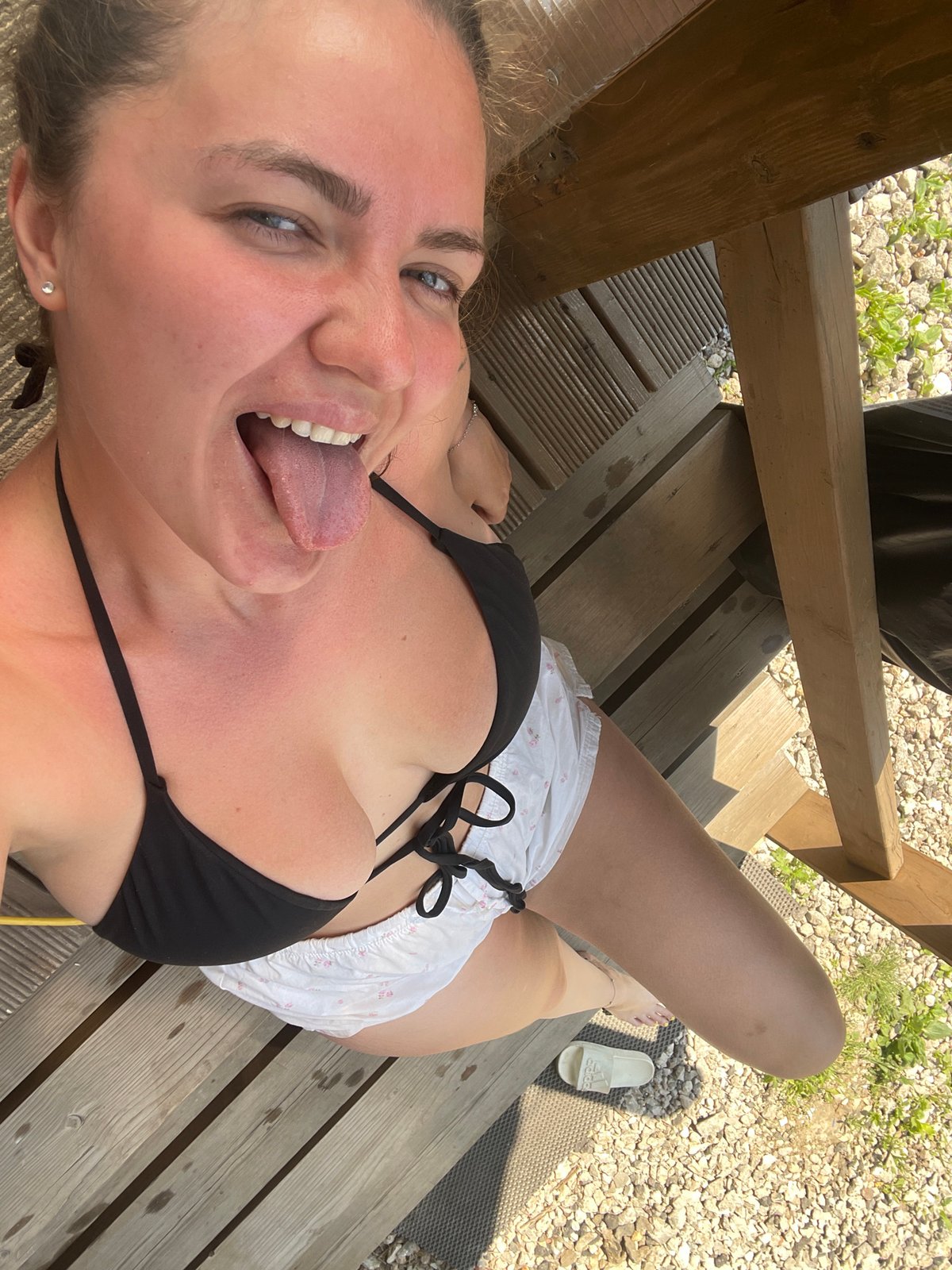 Woman Takes Selfies in Russian Backyard Construction Area