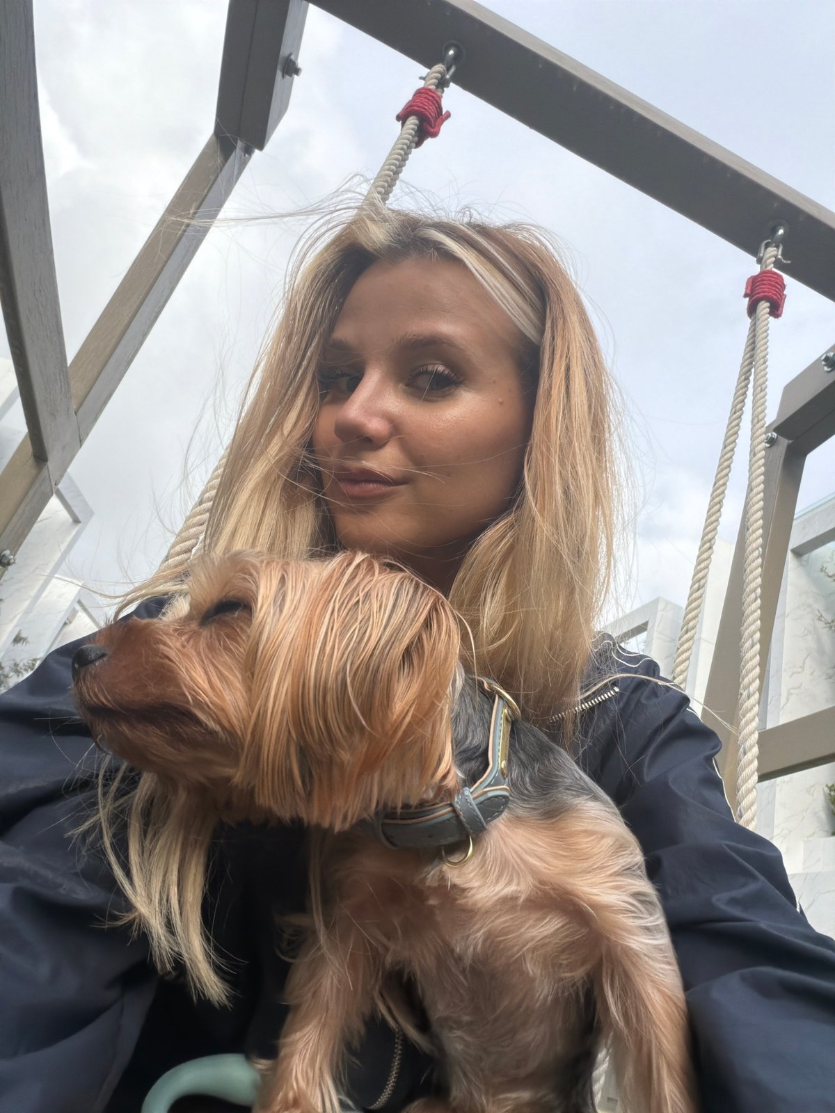 Swing-set selfies with a Yorkshire Terrier in Thep Krasatti