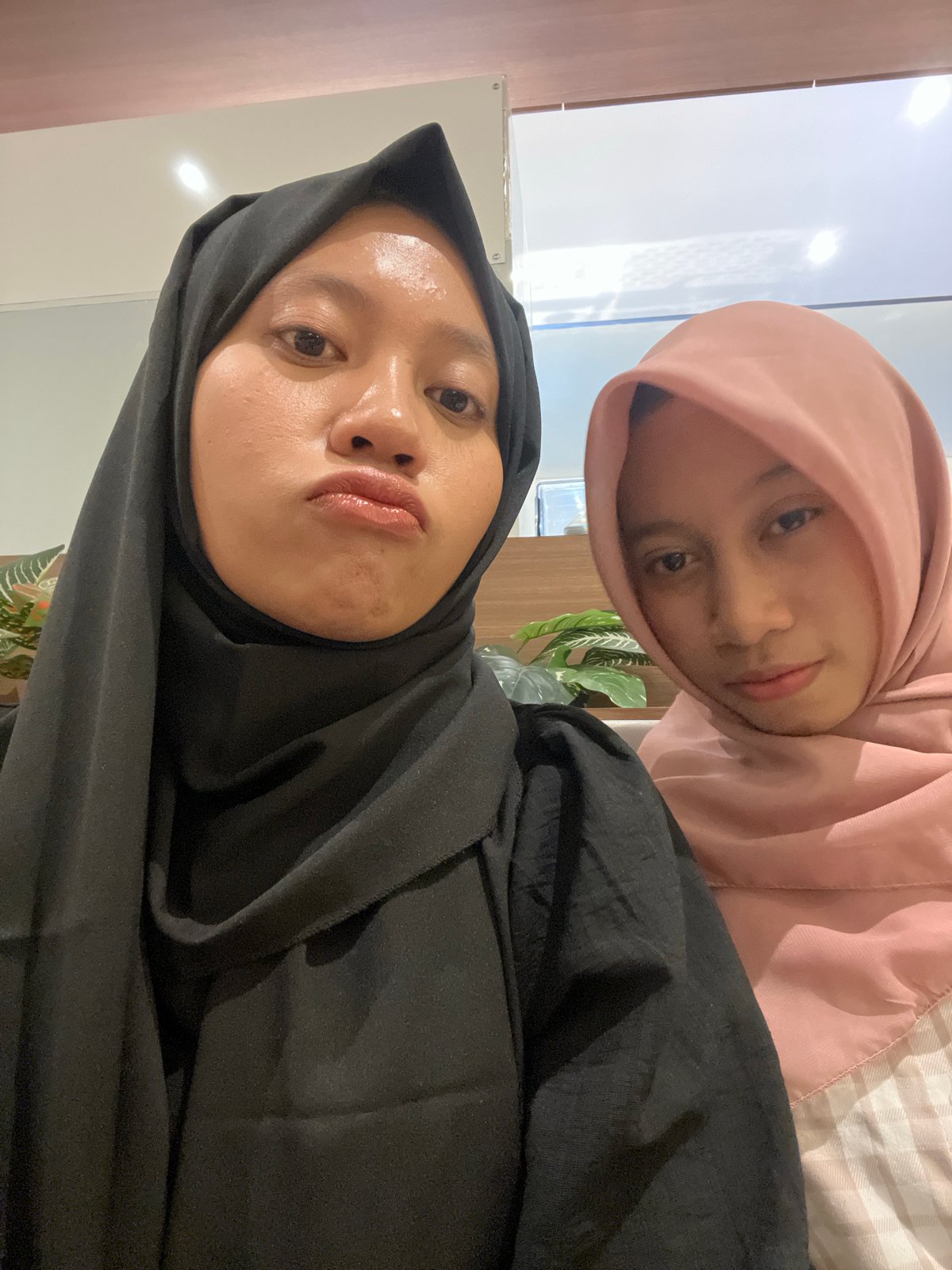 Café selfie session with iced drinks in Lumajang
