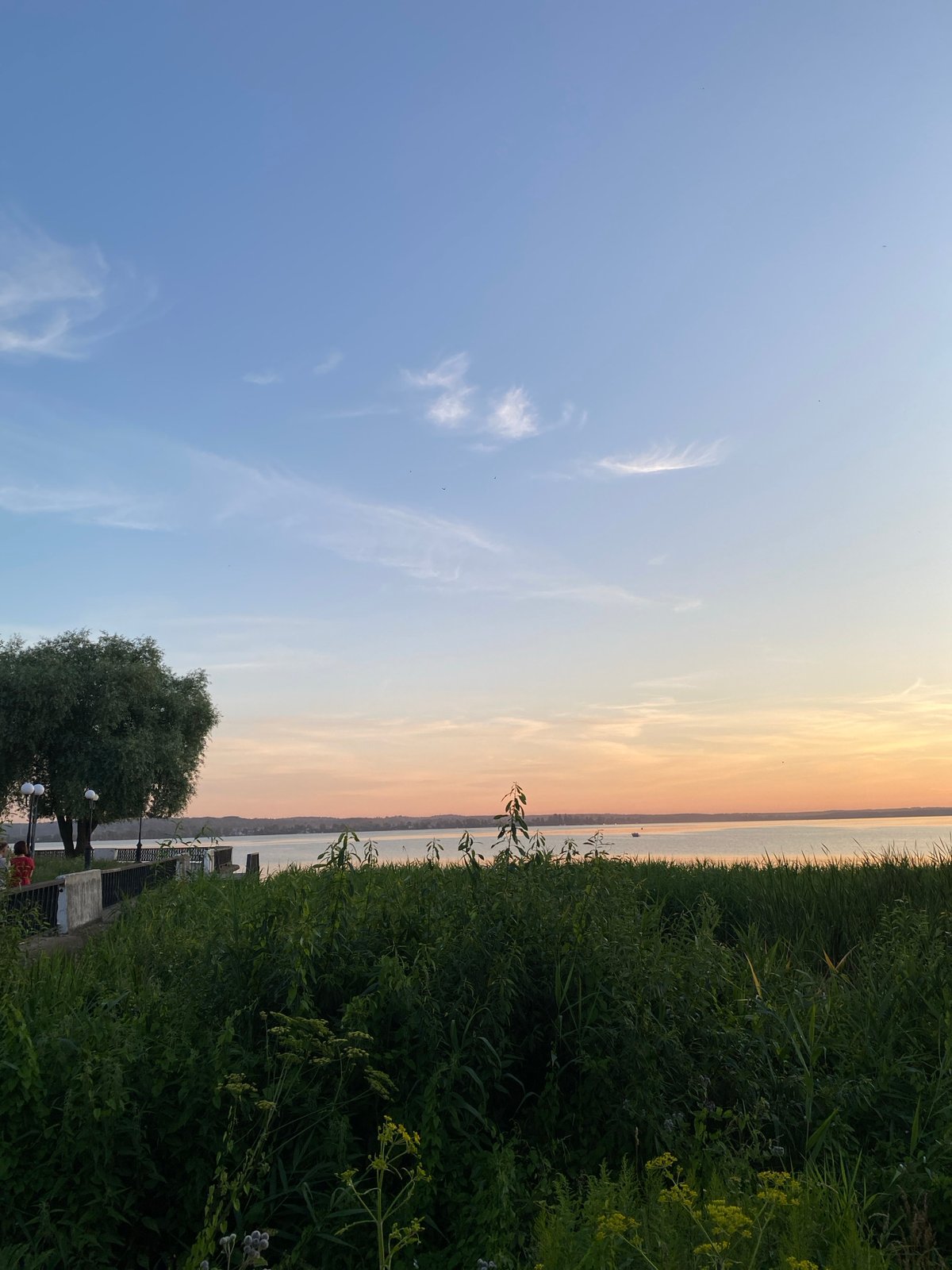 Sunset evening at the Votkinsk Reservoir, pedal boats docked