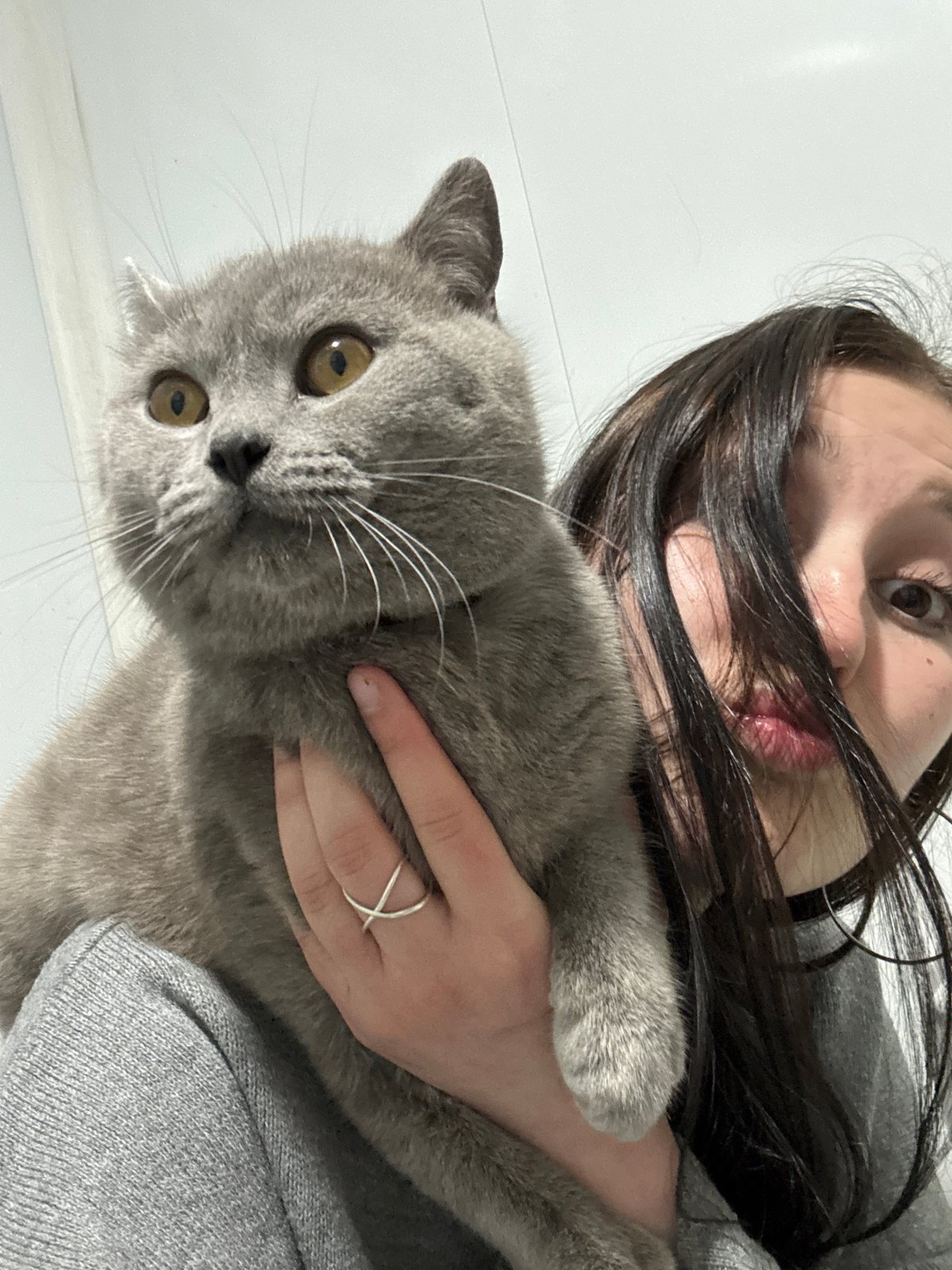 Woman Takes Tender Selfies With Gray Cat in Russian Village