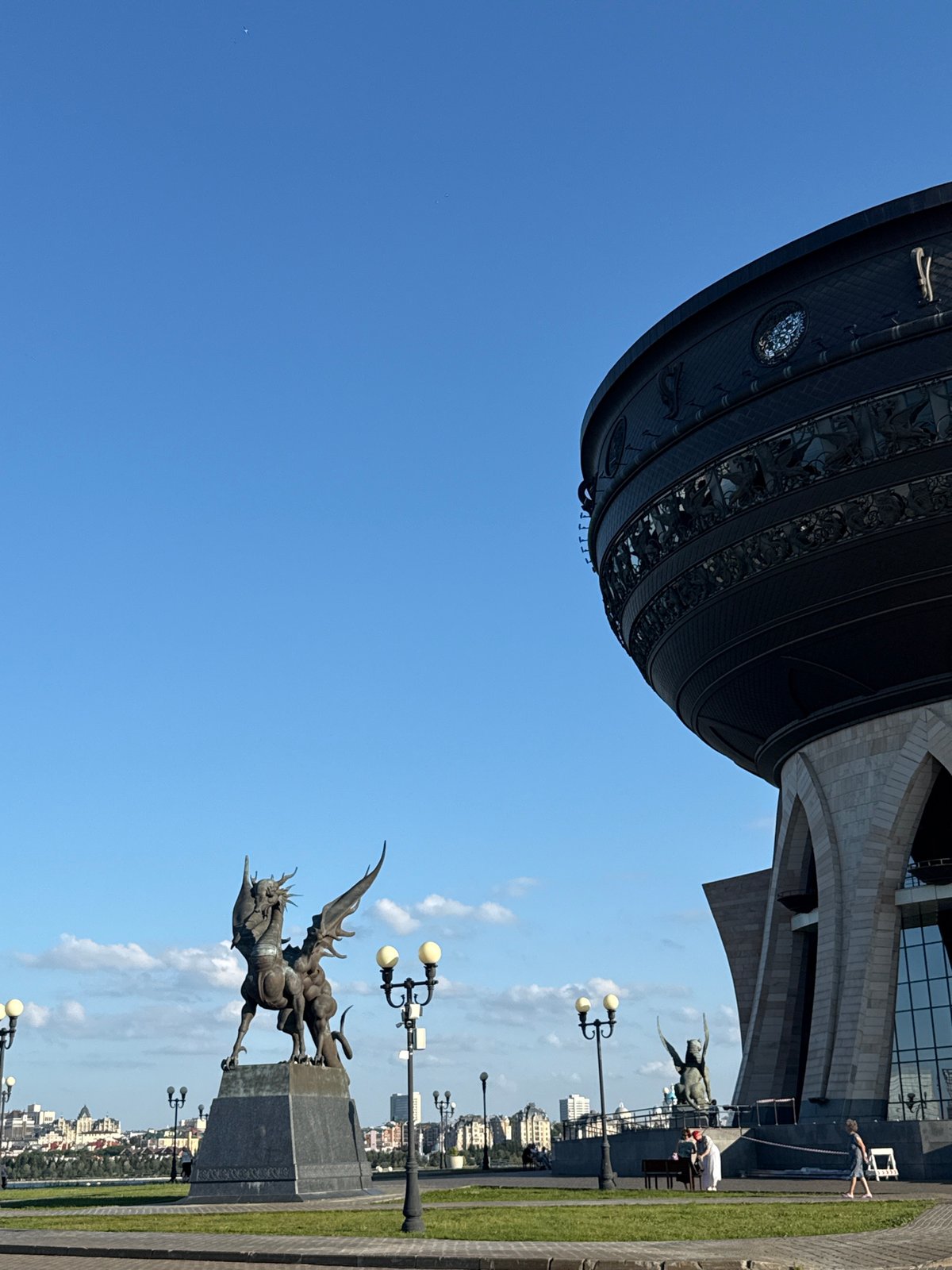 Kazan's Zilant statue and riverfront landmarks on a sunny day
