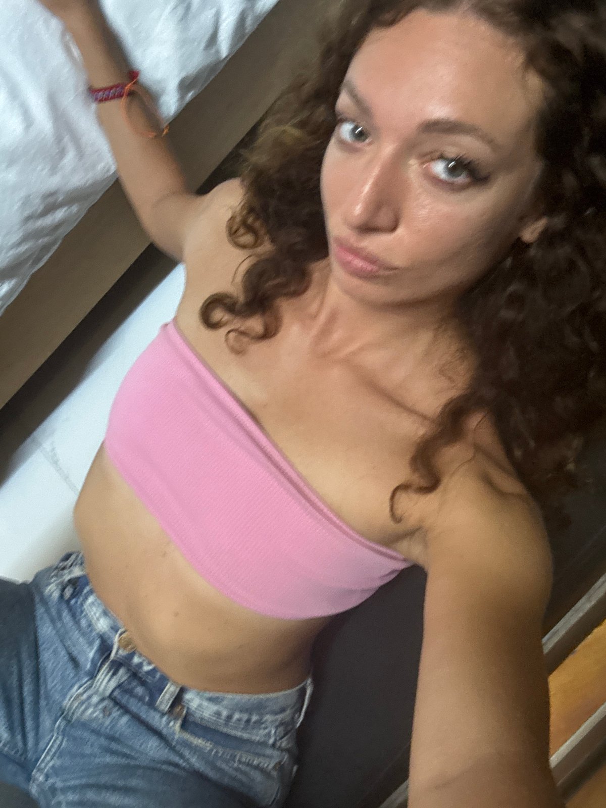 Woman takes selfies in pink outfit in Than Uyên