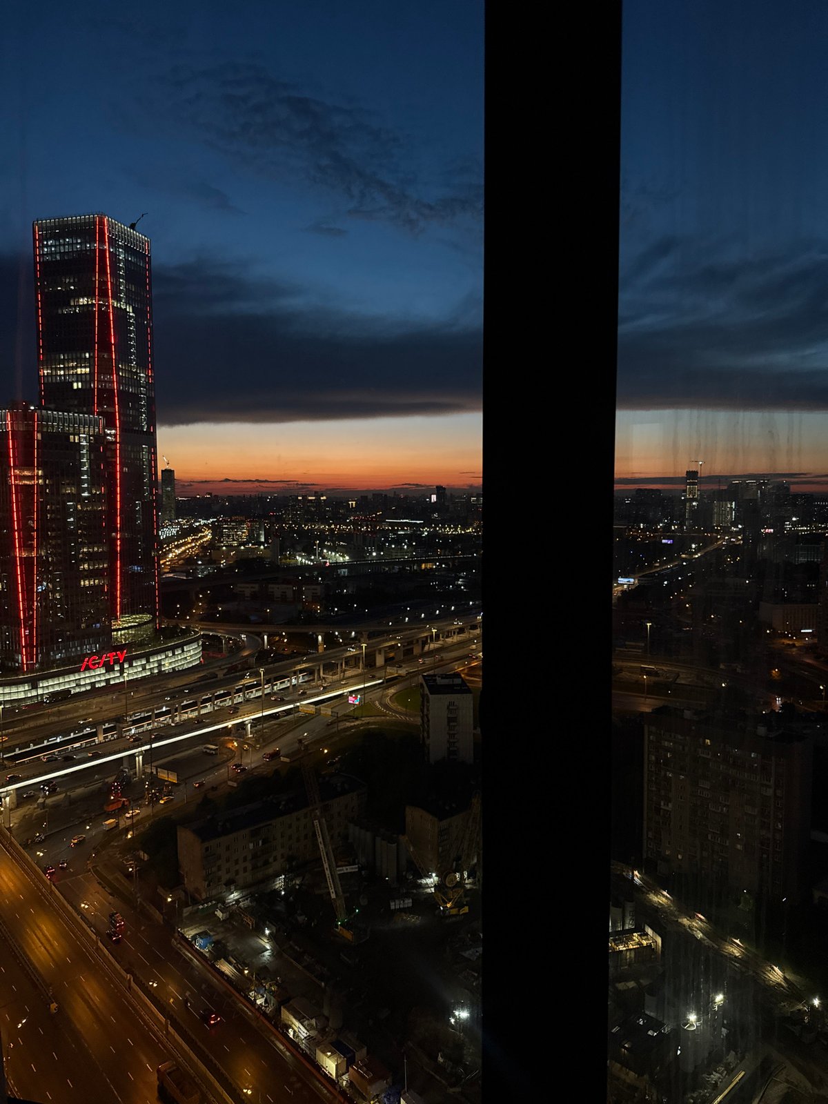 City skyline at dusk, multiple aerial angles