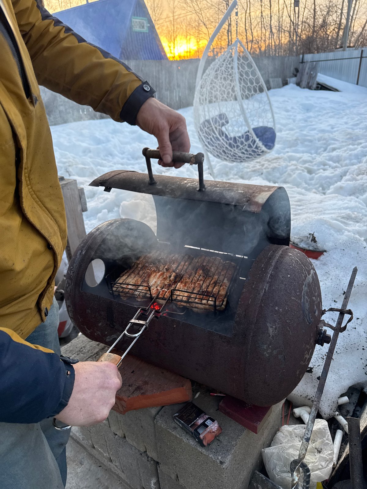 Winter barbecue gathering documented in snowy Chaikovsky, Russia