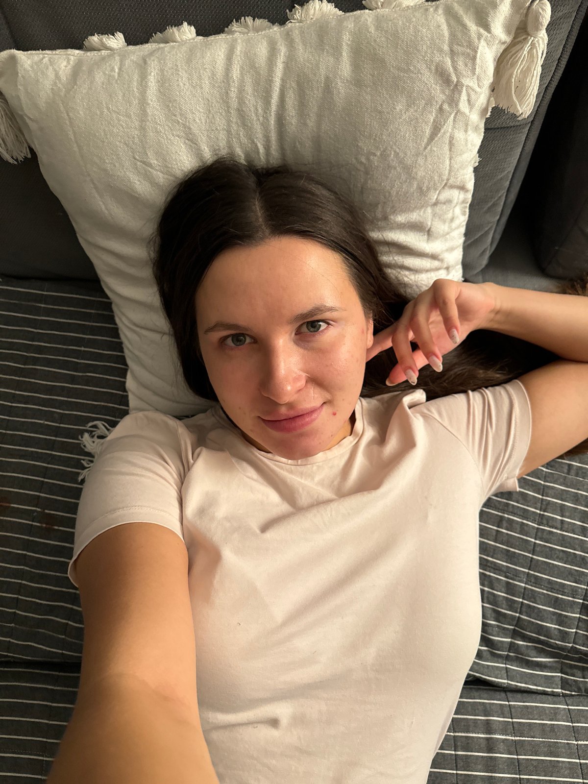Woman photographed at home with cat in Odintsovo