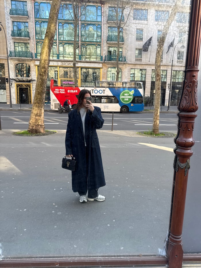 Person documented walking near Opéra Garnier in Paris