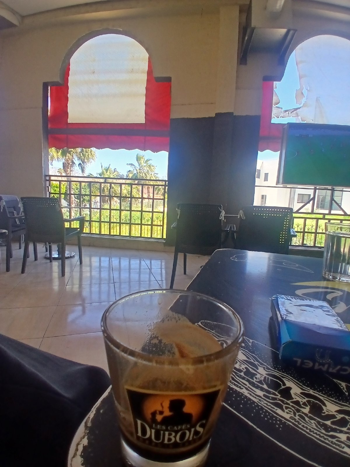 Coffee break scene captured at Meknes cafe