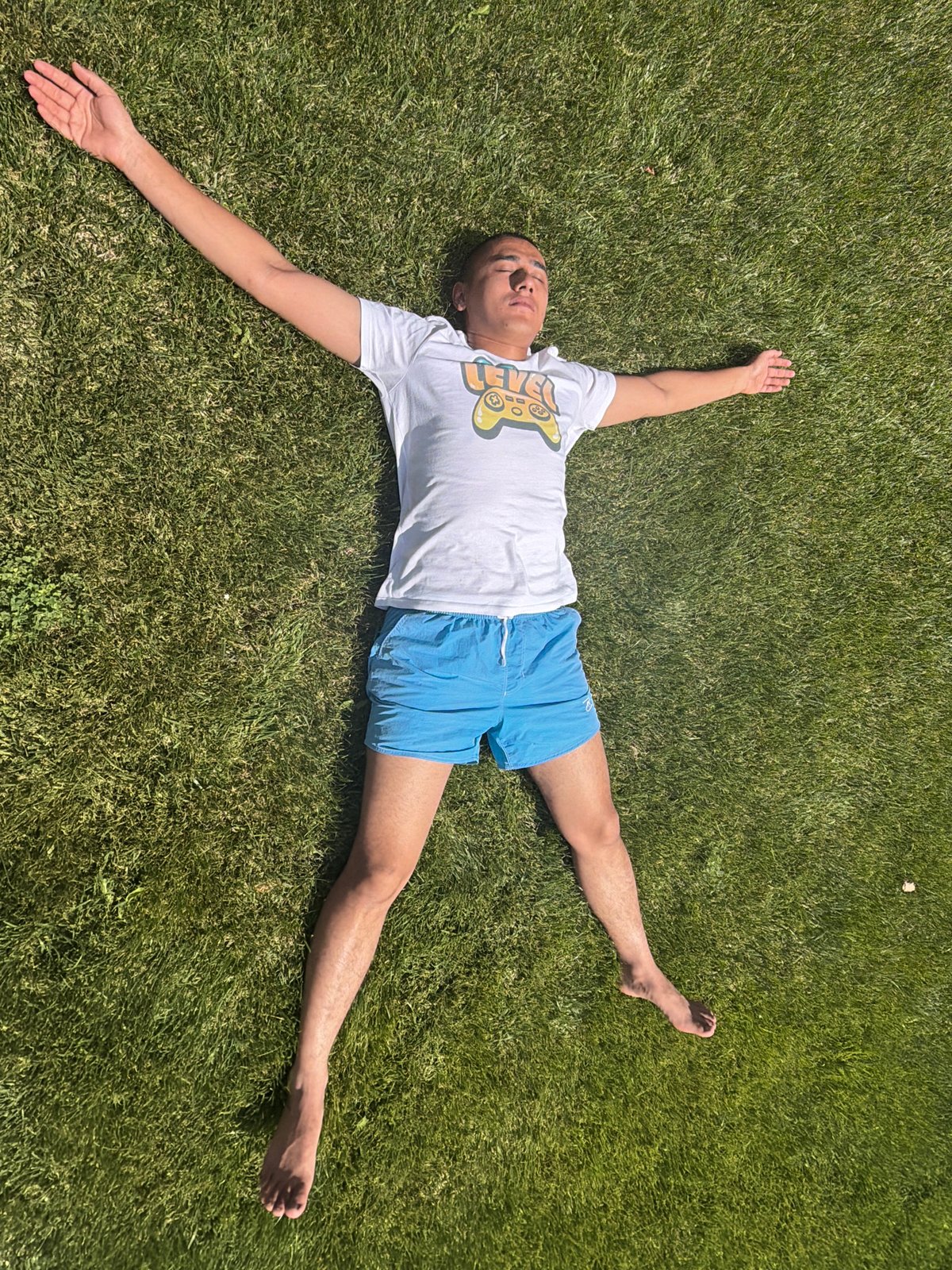 Backyard meditation session: sun, grass, and stillness