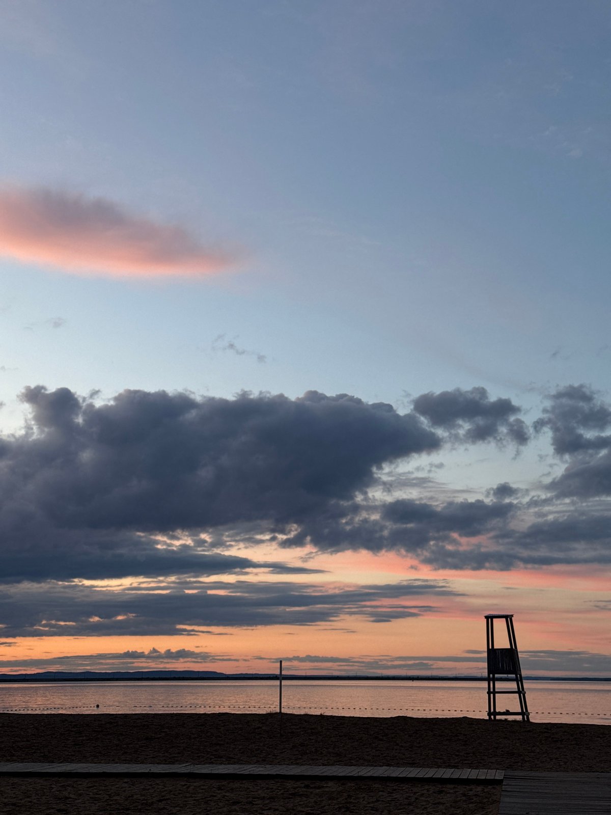 Sunset documented along Chaikovsky waterfront beach and promenade