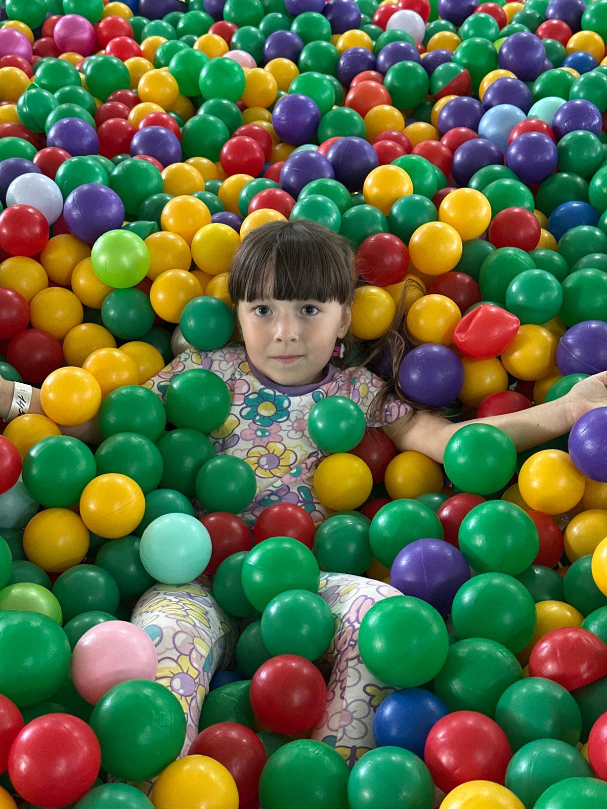 Child plays at indoor playground in Chaikovsky, Russia