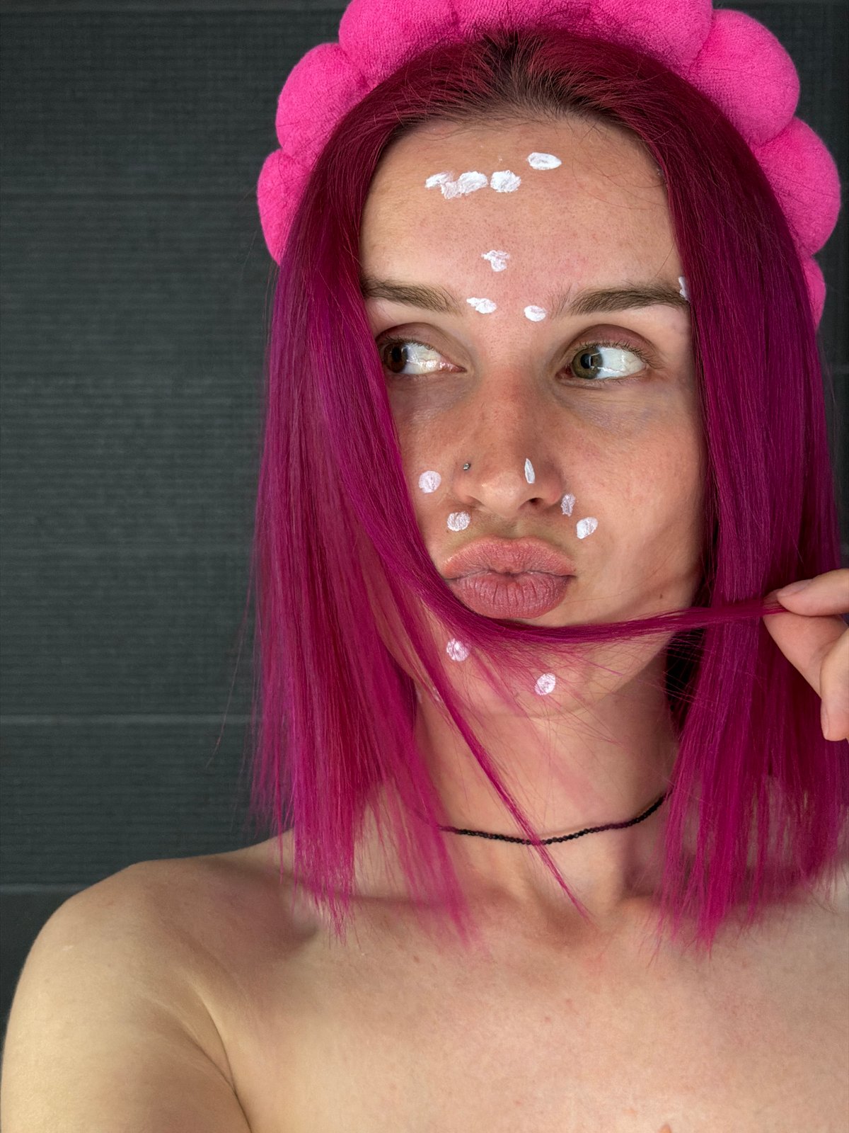 Magenta hair and pink accessories in a Chaikovsky selfie portrait