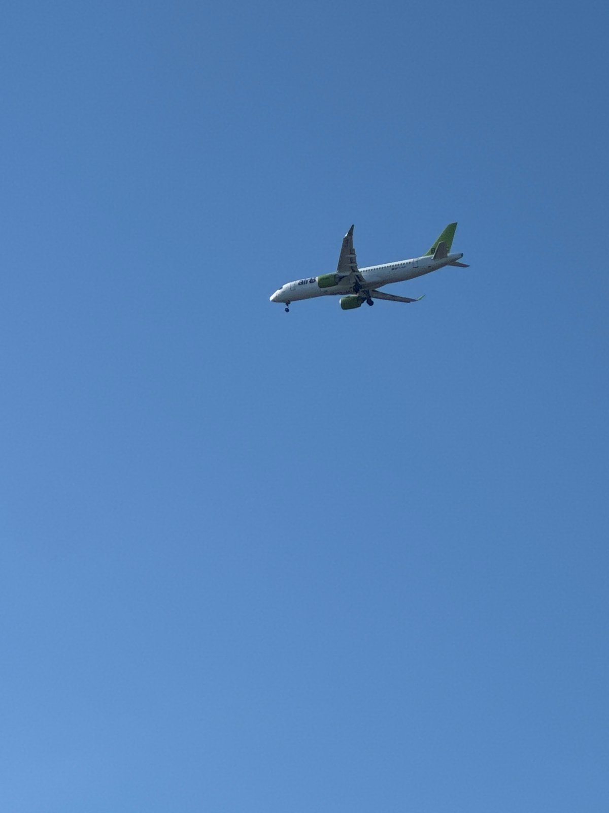 Aircraft performs aerobatic maneuvers over Tallinn in early morning