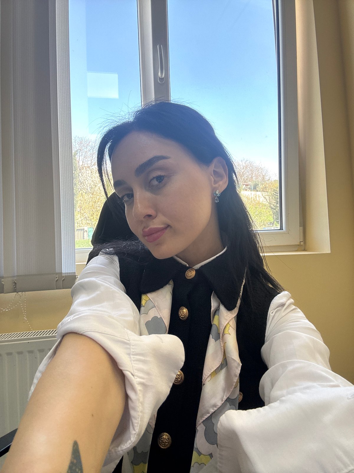 Woman photographed at office workspace in Tbilisi