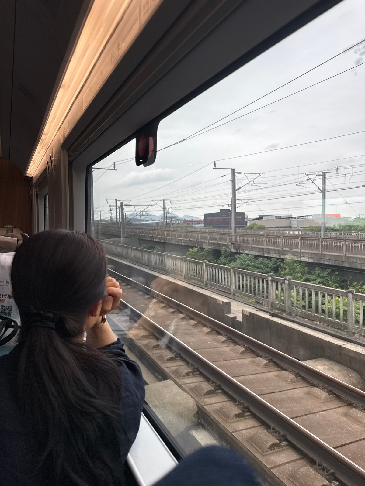 Train window view through Shangcheng District, Hangzhou