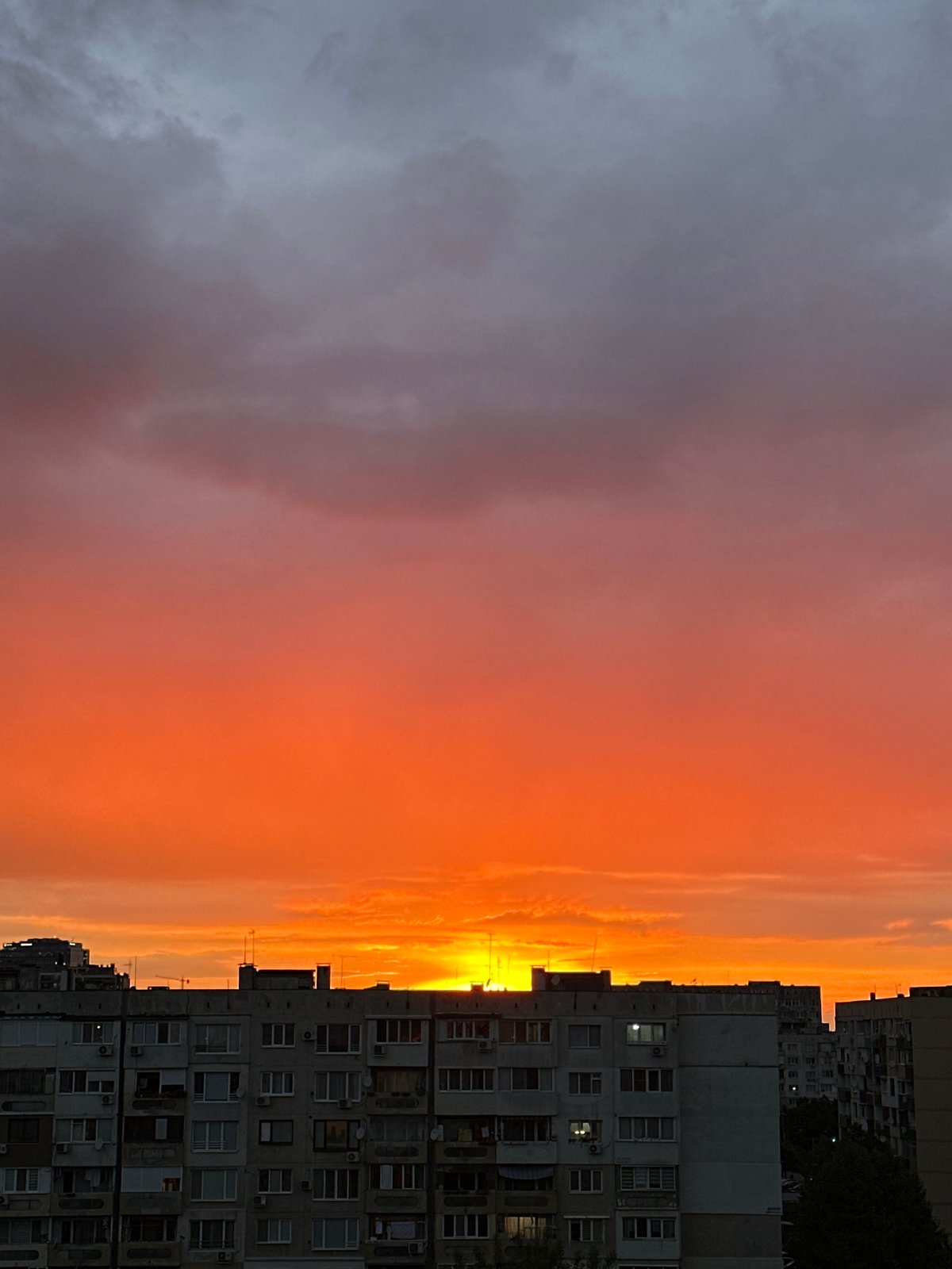 Vibrant sunset illuminates Sofia's urban landscape