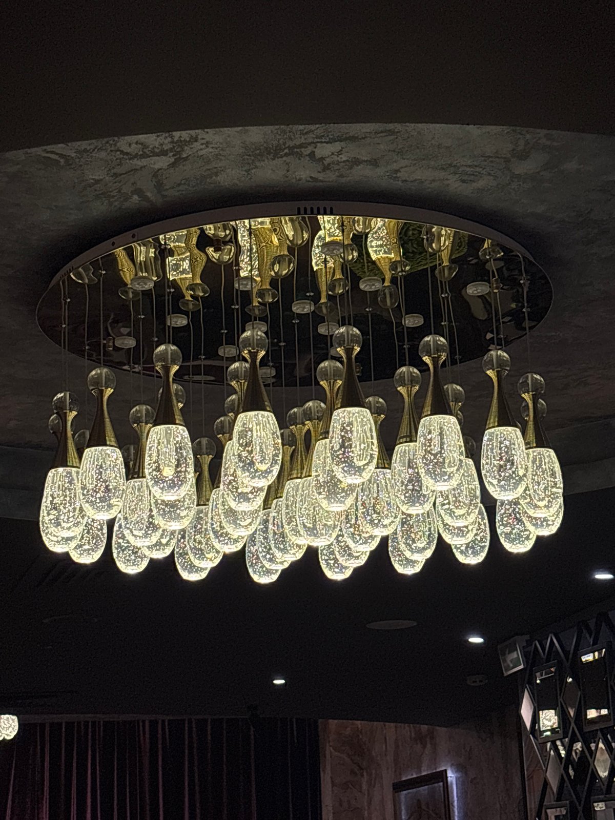 Upscale Minsk restaurant interior documented during evening dining hours