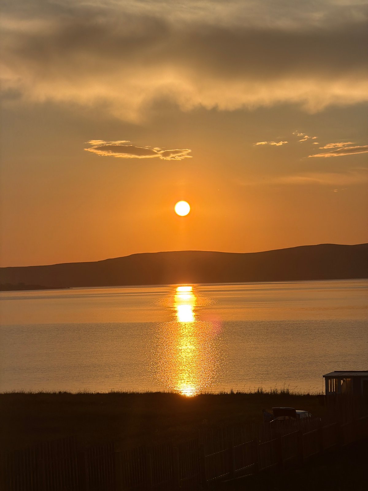 Lakeside grilling and sunset at a Russian surf camp