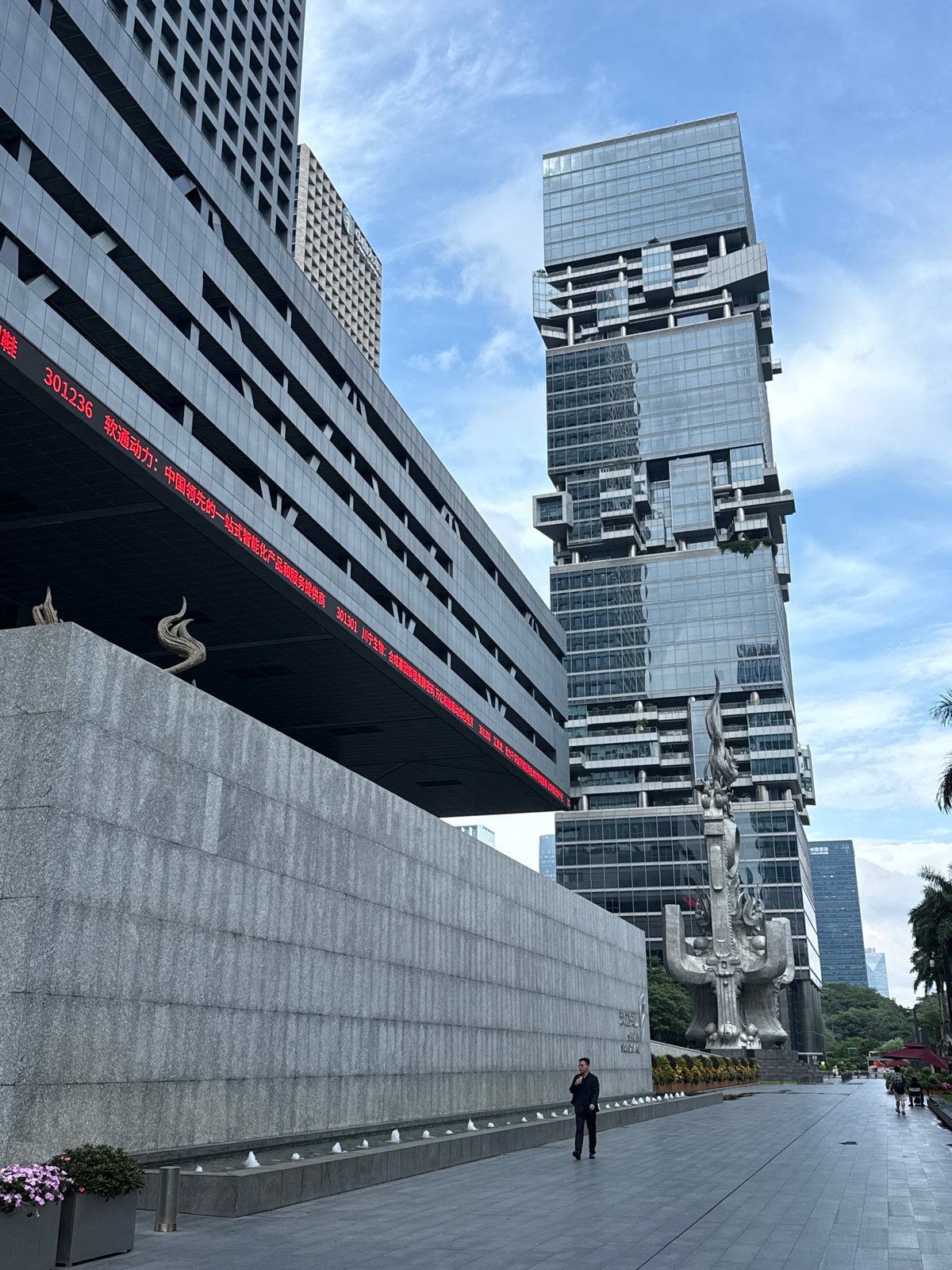 Futian District skyline documented under changing cloud cover