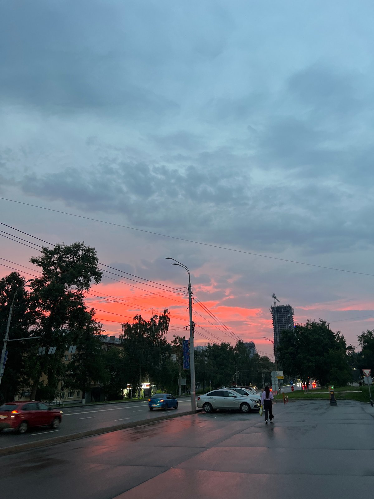 Izhevsk streets glow under a dramatic summer sunset