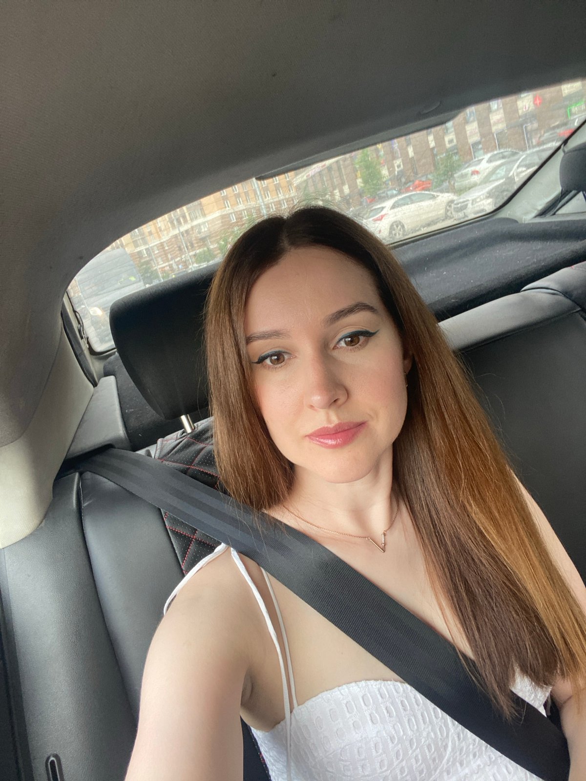 Close-up portrait in the back seat of a car, Russia.