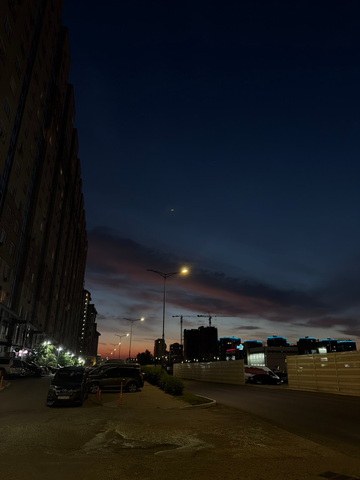 Midsummer evening light across Krasnoyarsk streets and parks