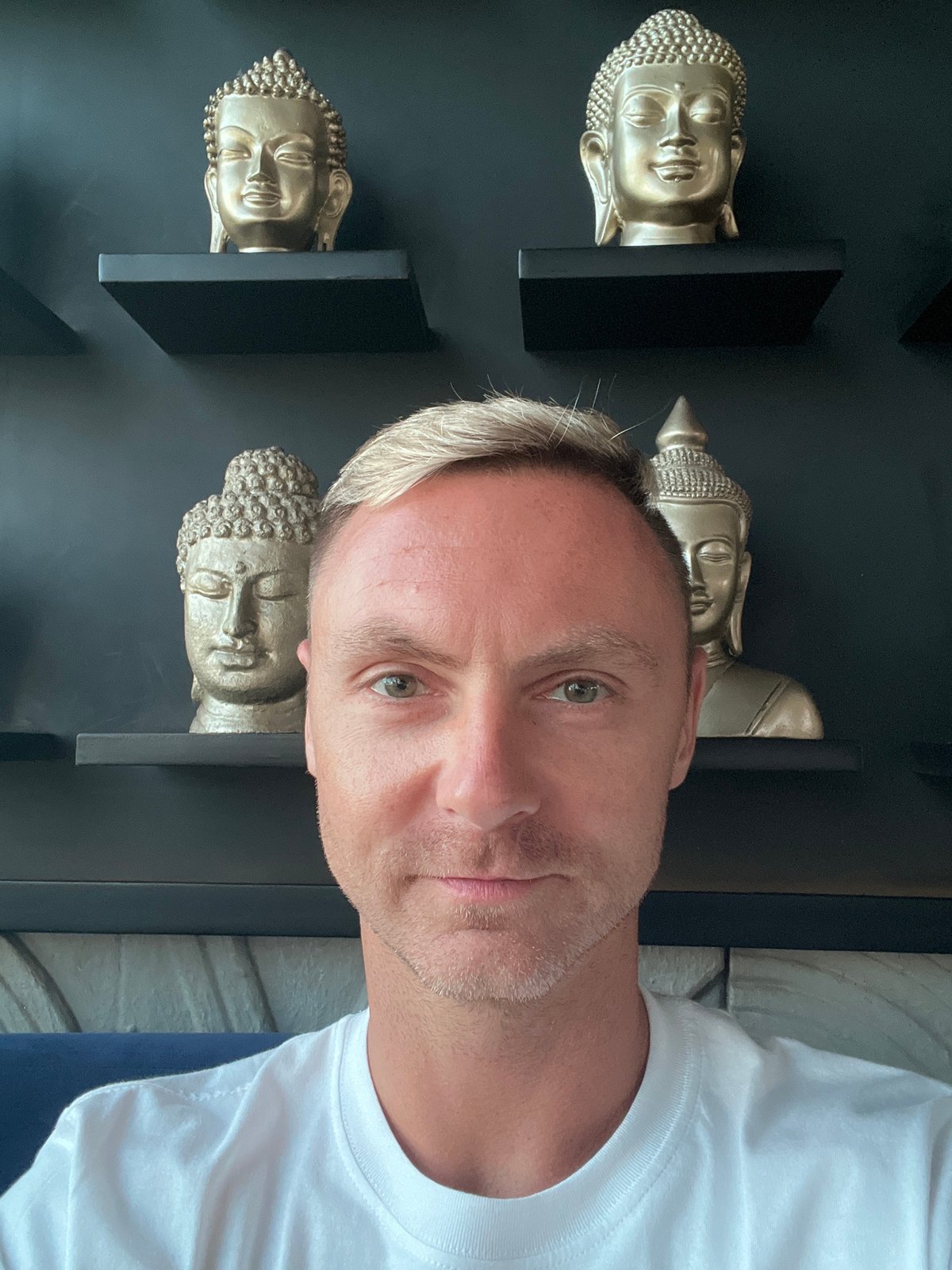 North Kuta streets, storefronts, and Buddha shelf interiors