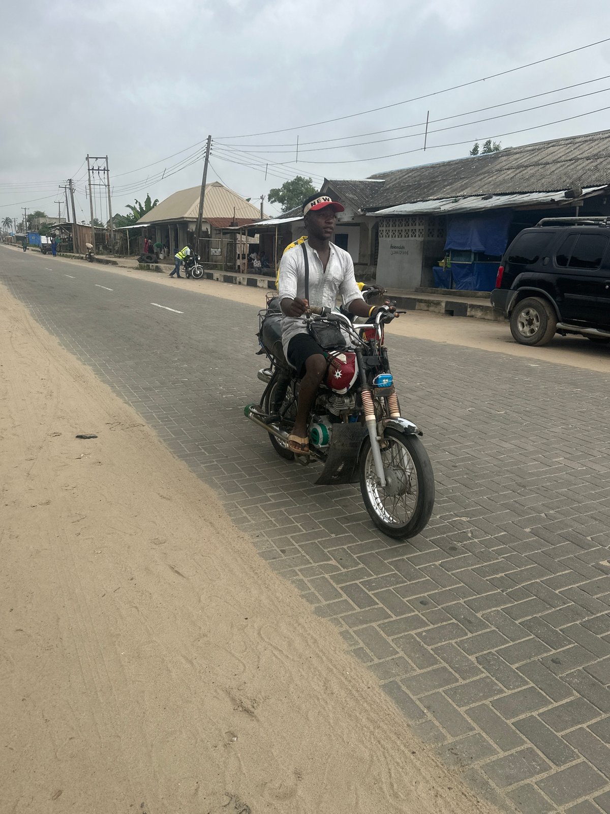 Morning street life and foot traffic in Badagry, Nigeria