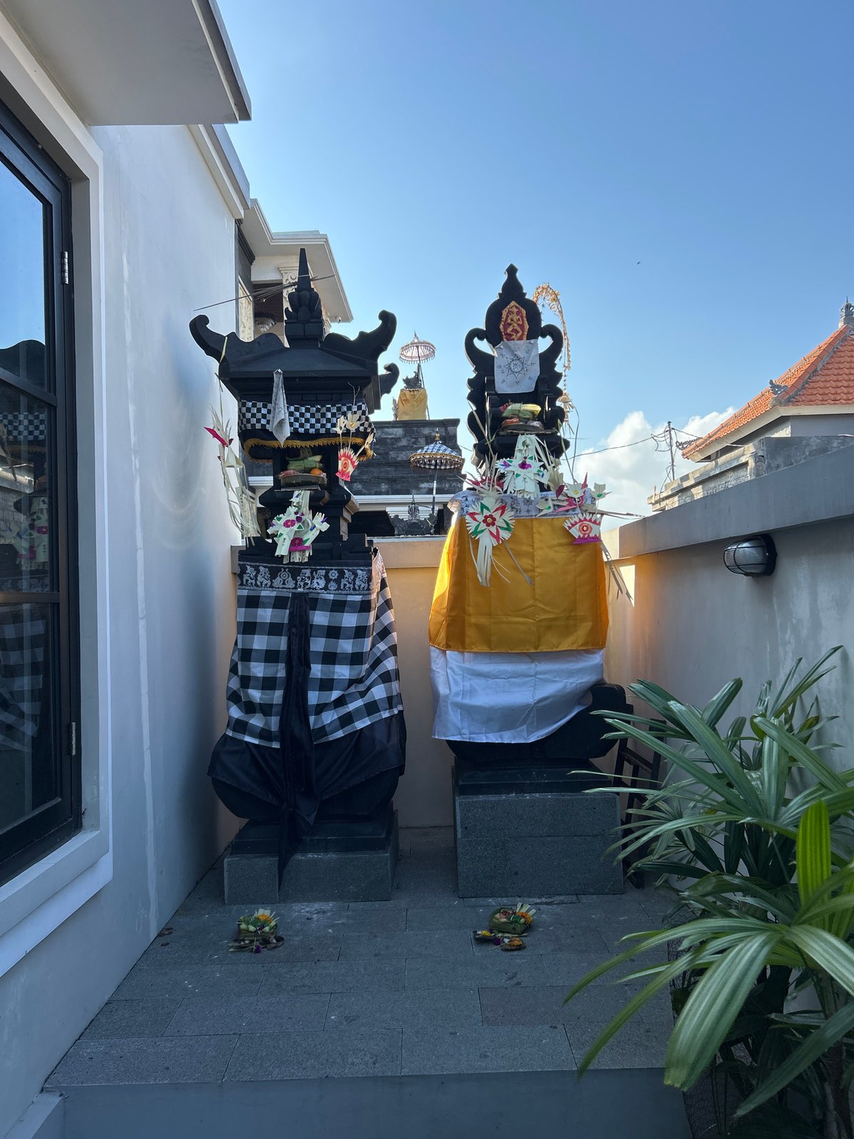 Balinese offerings and ceremonial shrines at a Sukawati compound