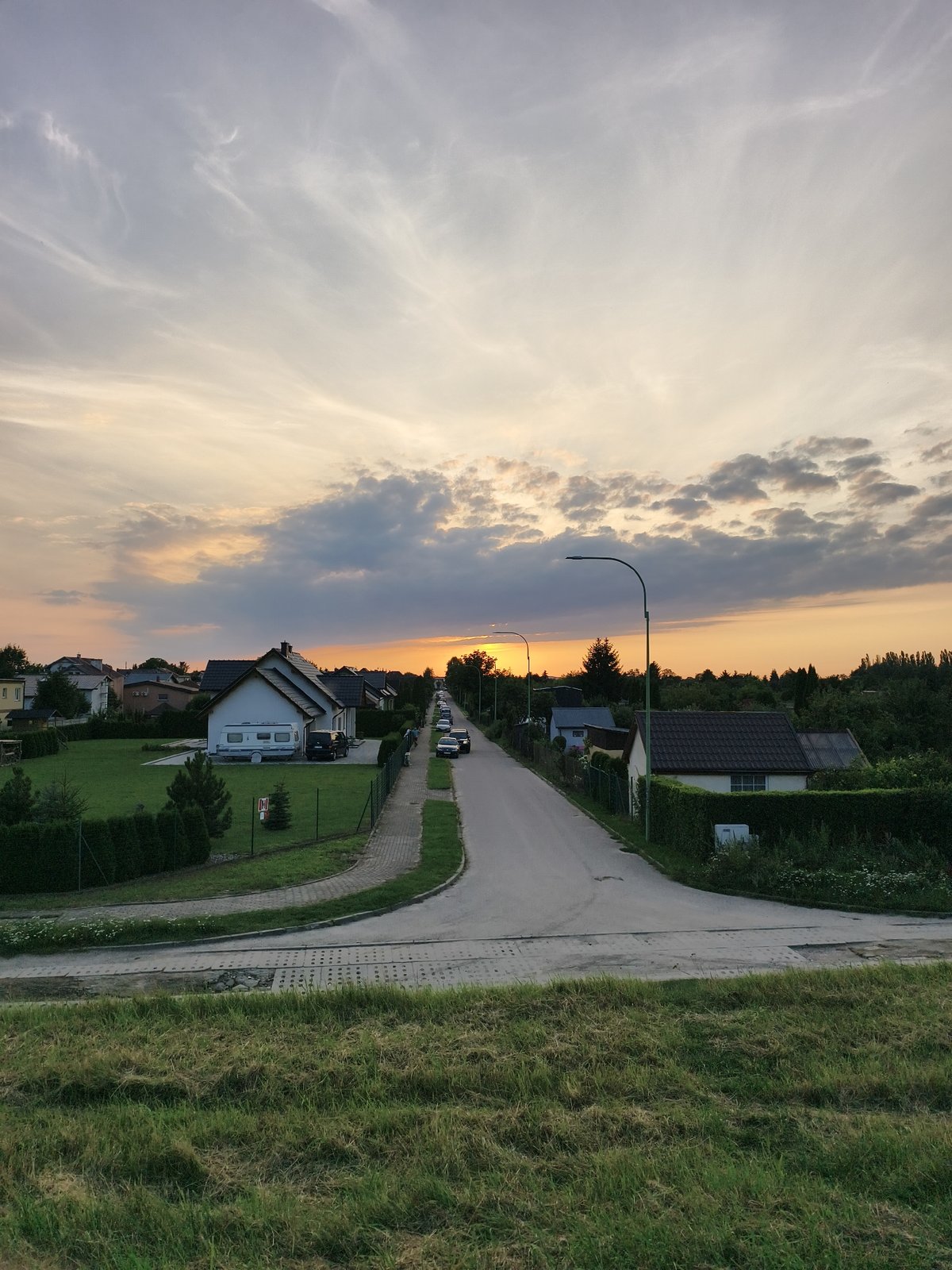 Sunset over Tczew's suburban streets and paths