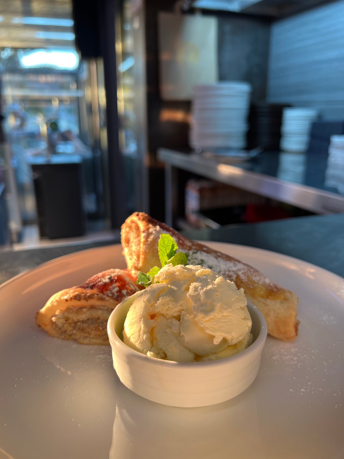 Restaurant patron enjoys dessert in Budva, Montenegro