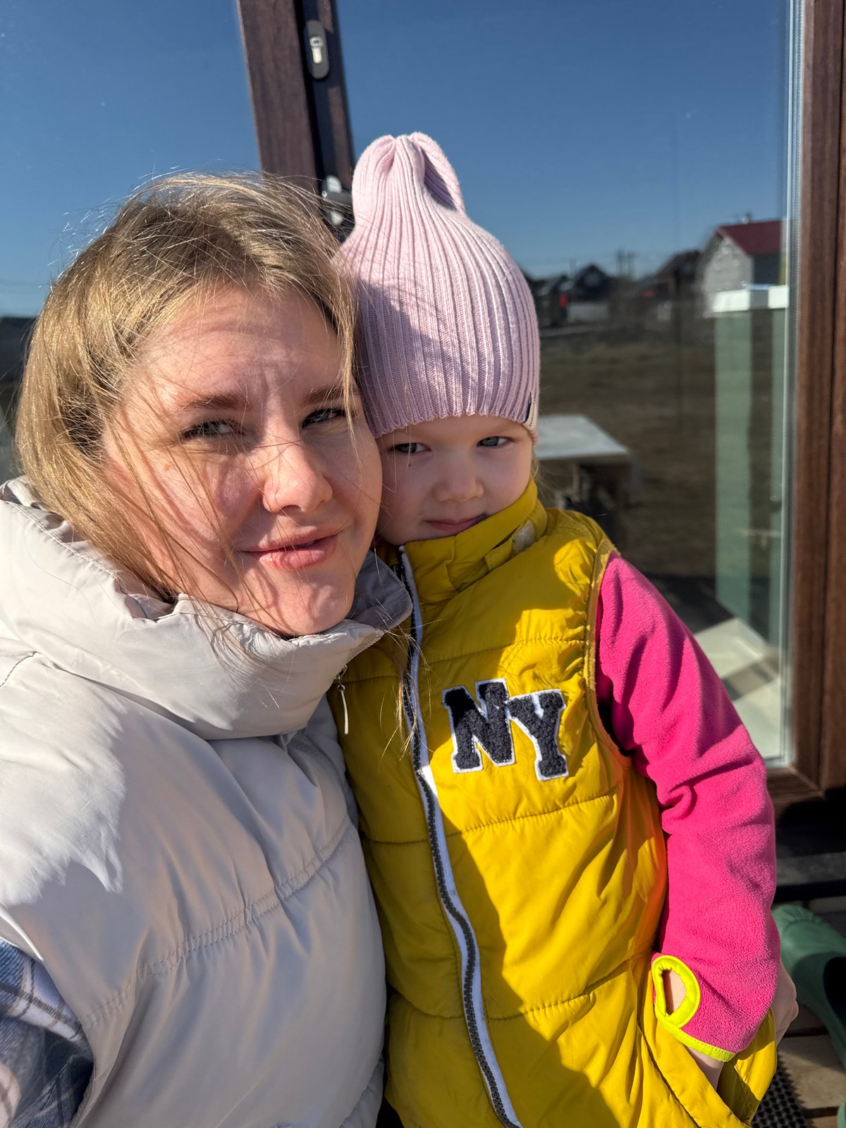 Woman and child enjoy outdoor morning in Gornyi, Russia
