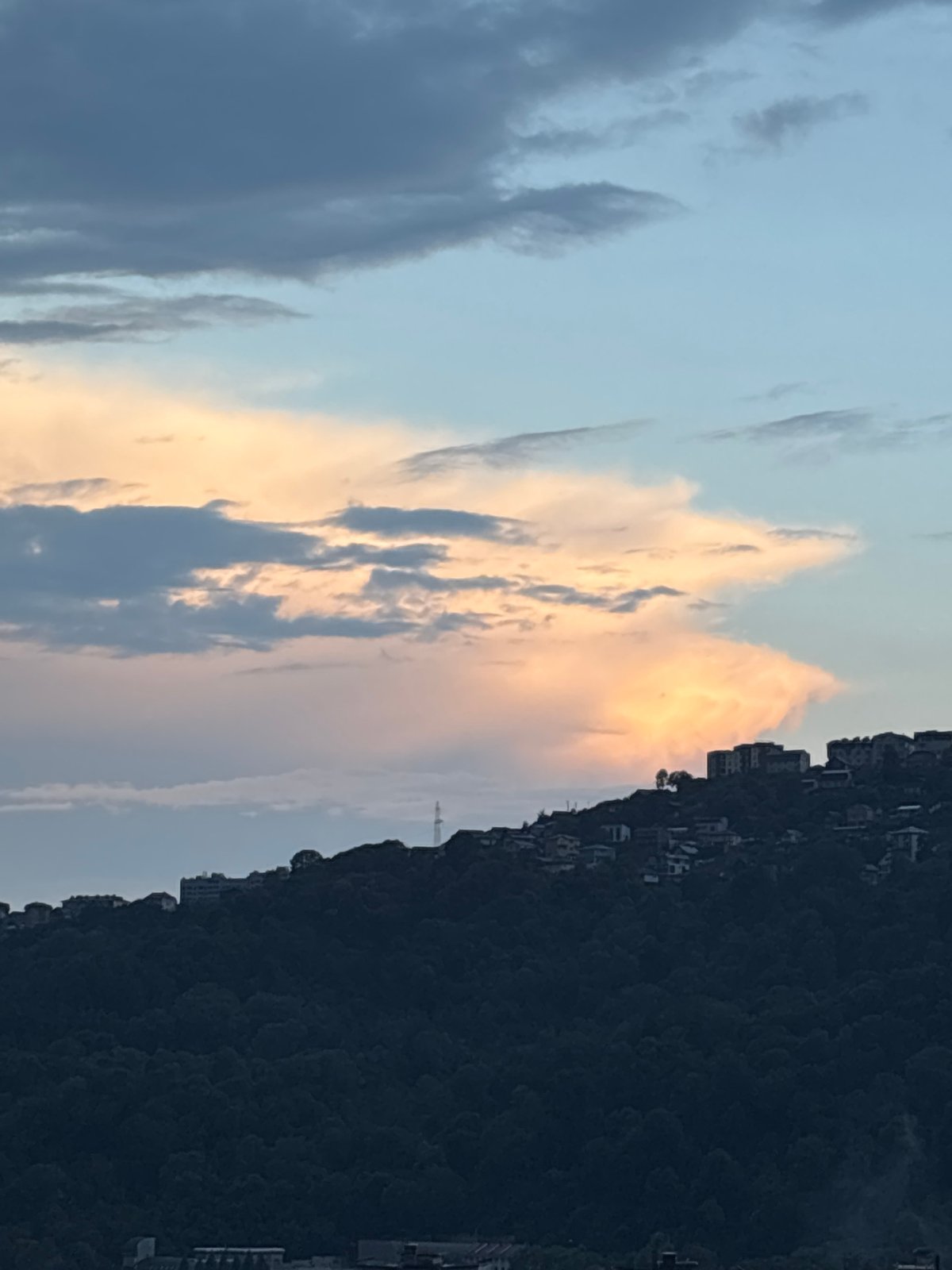 Sochi hillside neighborhoods at sunset, architecture and skyline