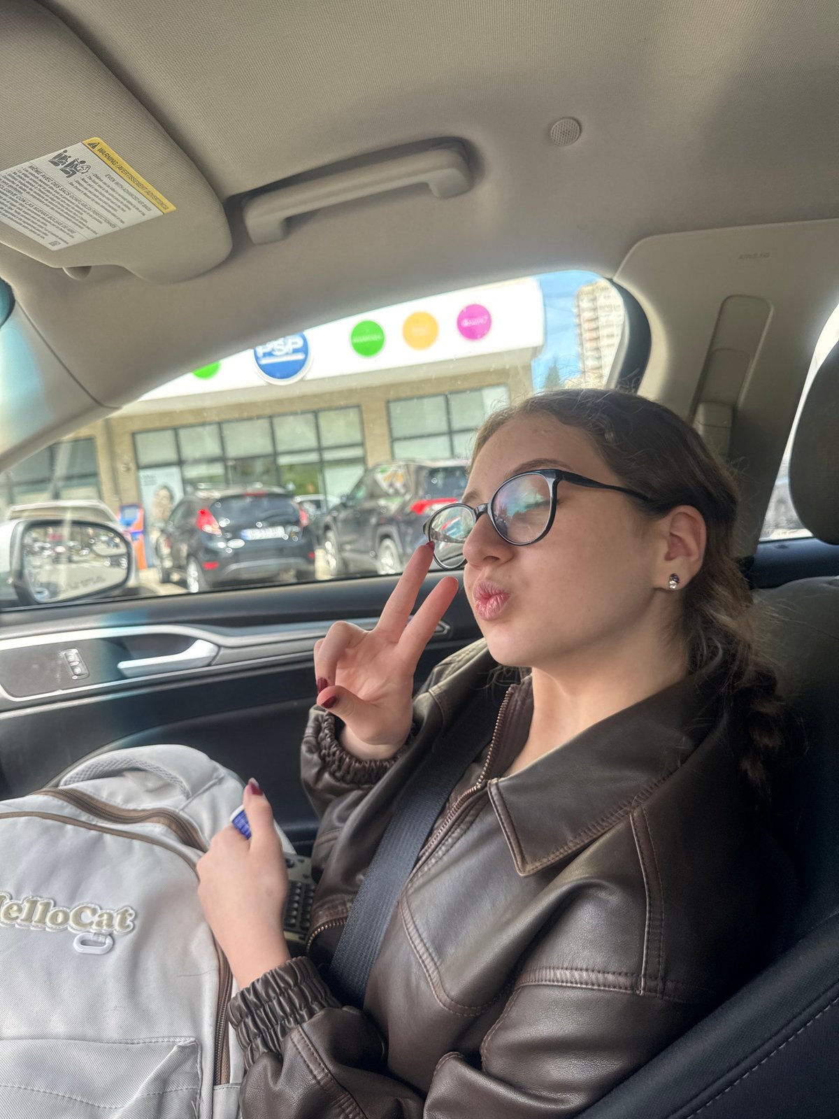 Young people captured in casual car moments in Tbilisi