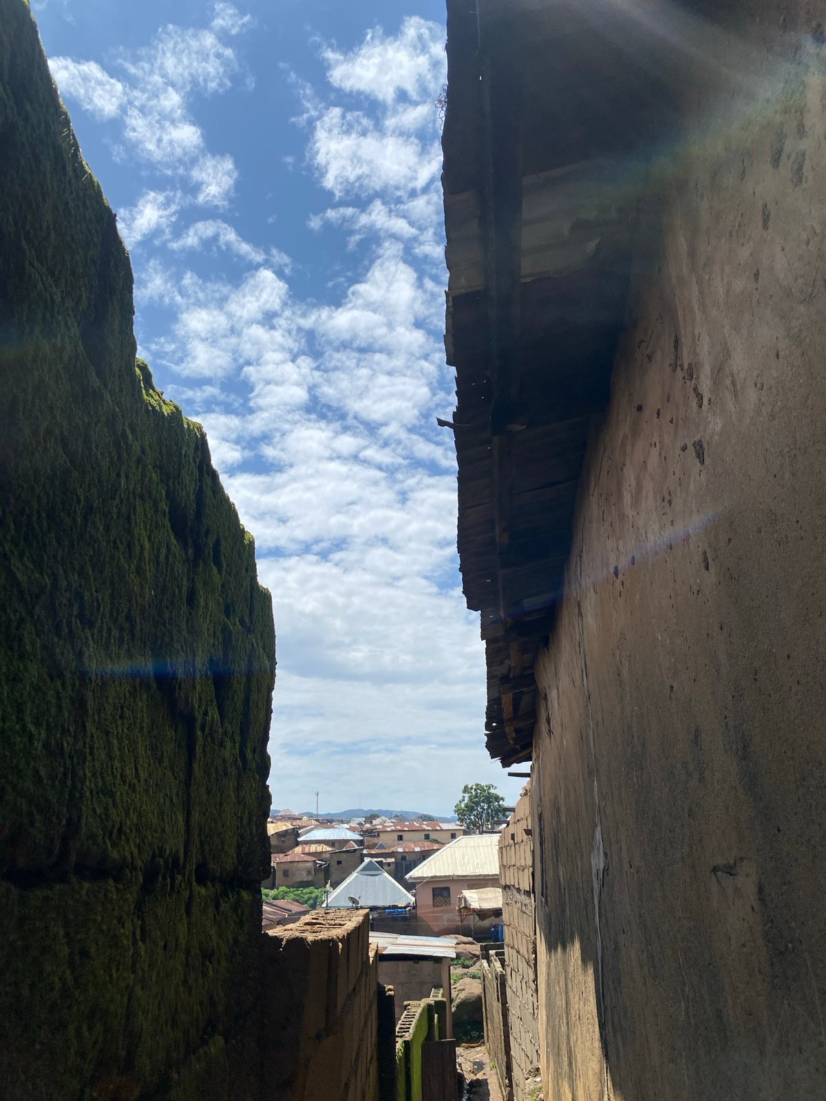 Street life and tight alleyways in Jos, Nigeria