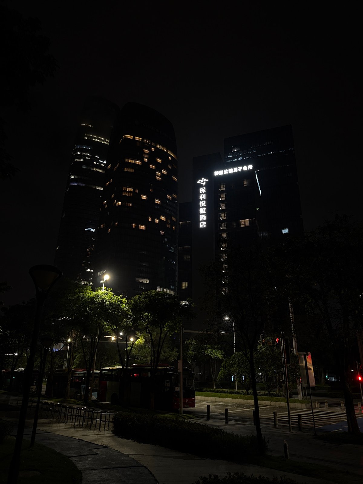 Haizhu District waterfront and streets on a wet June night