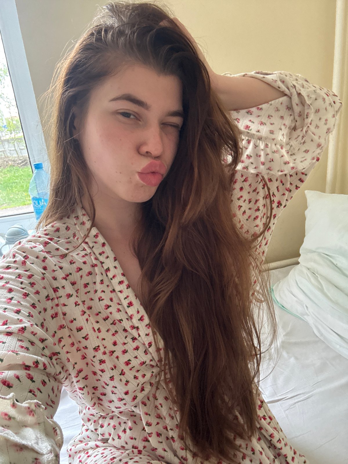 Woman photographed in bedroom setting in Ramenskoye, Russia