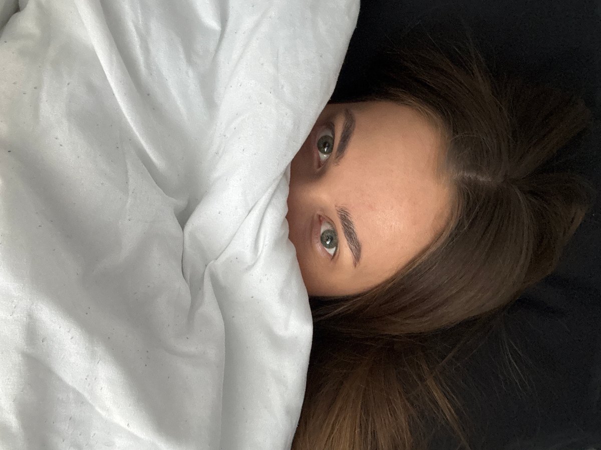 Woman and tabby cat share morning moments in Russia