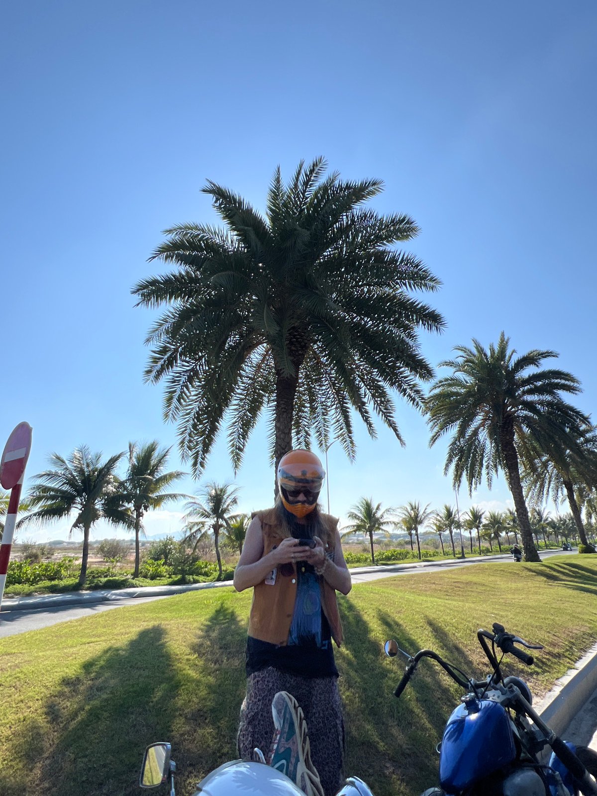 Motorcyclists gather for roadside break during Cam Ranh rally