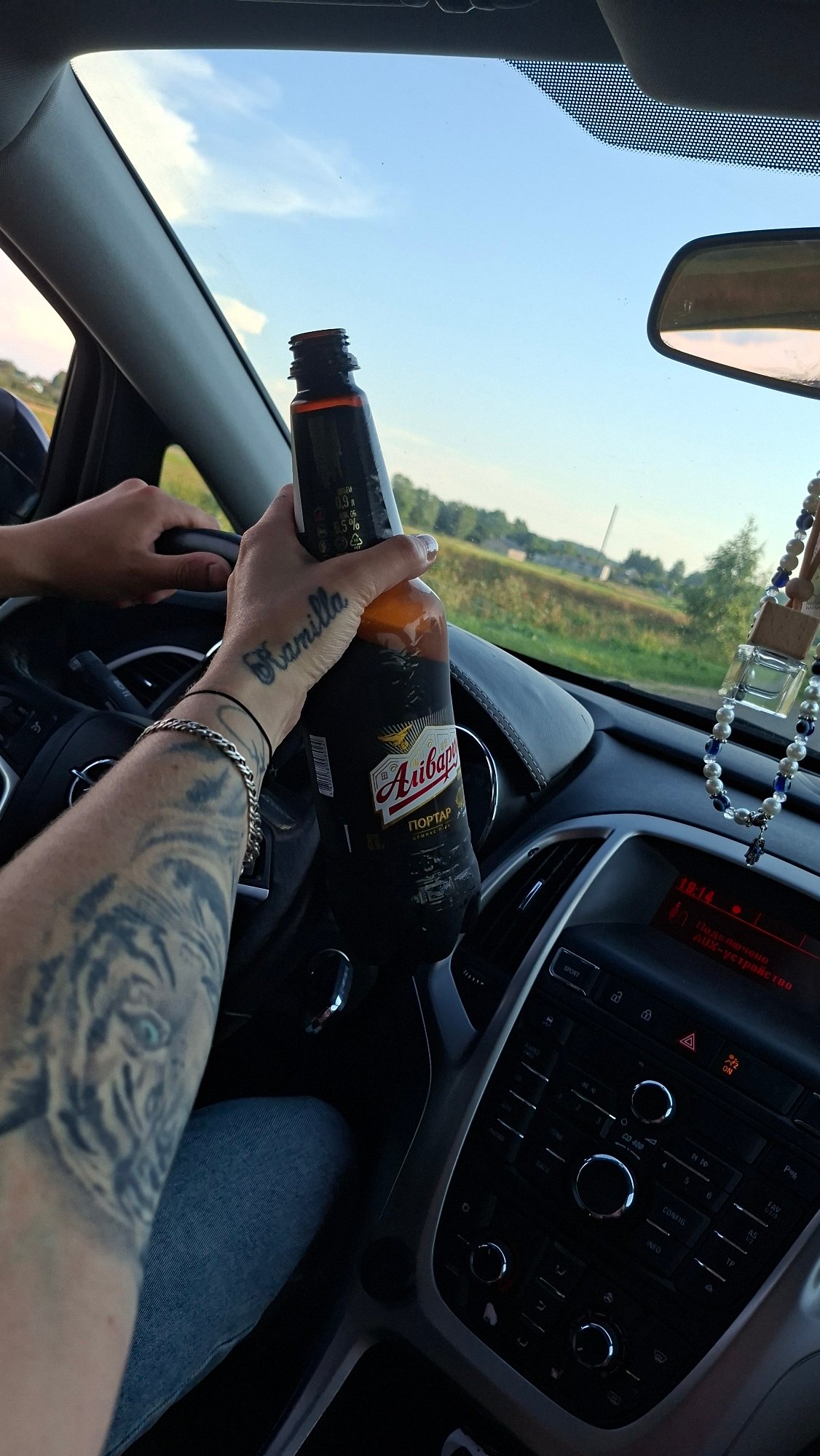Beer in hand, wheel in the other — driving in rural Belarus