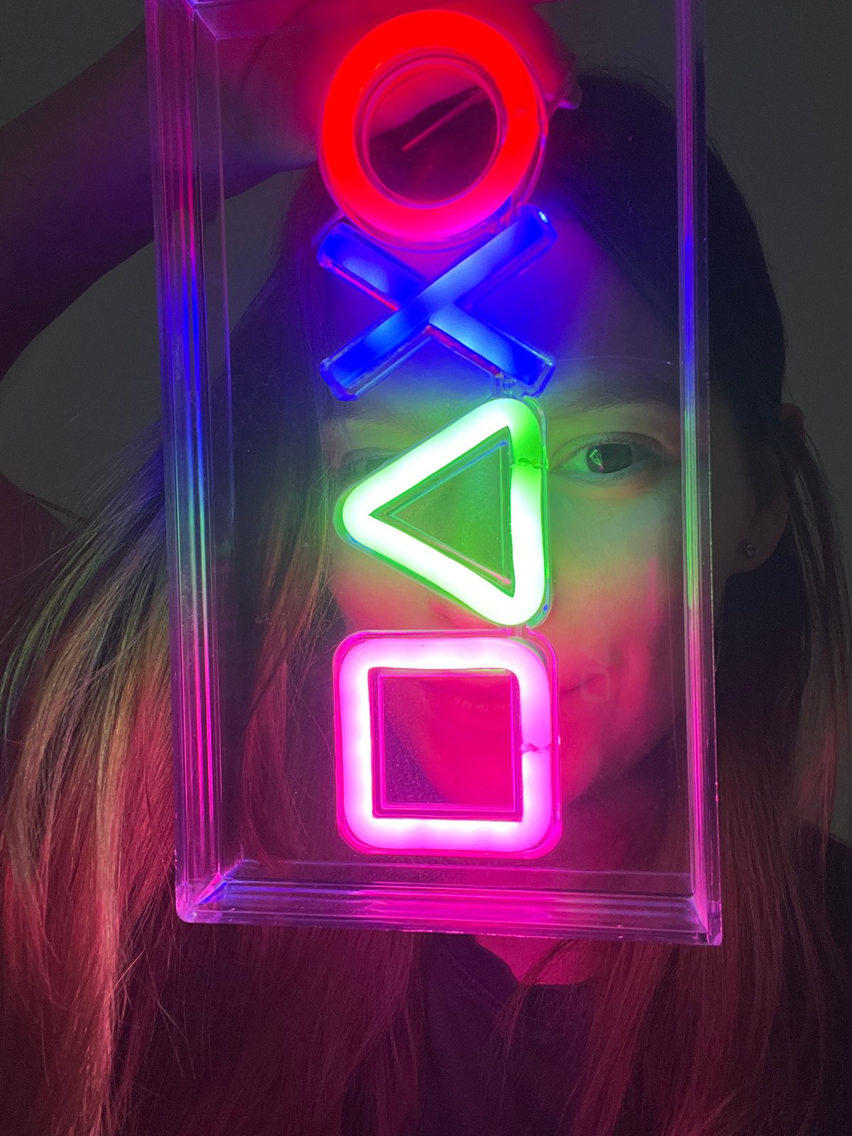 PlayStation neon sign unboxing amid everyday apartment life in Limassol
