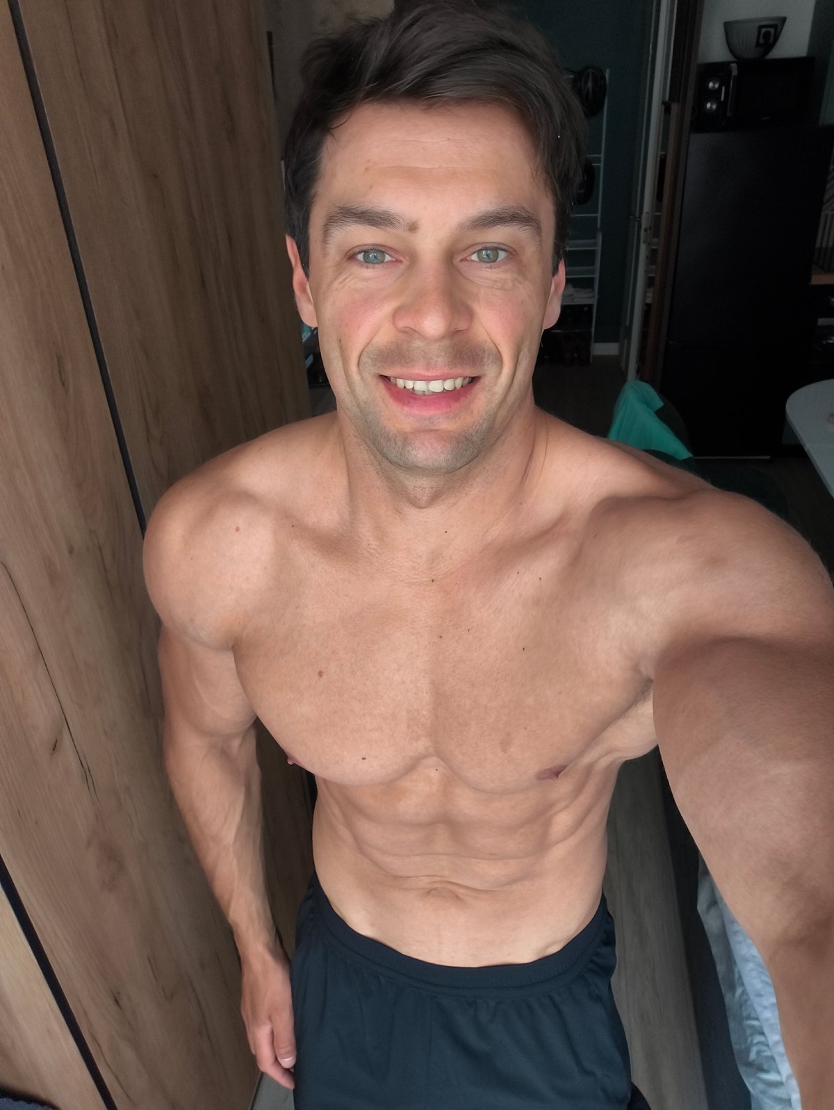 Man takes morning selfies in Moscow indoor location