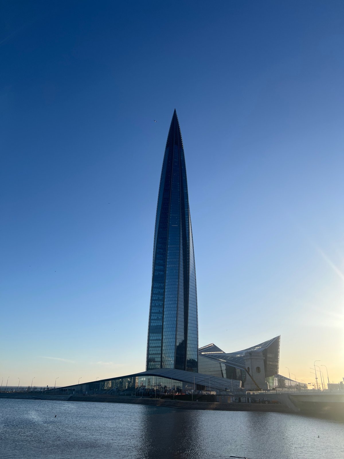Lakhta Center skyscraper observed under bright skies in Saint Petersburg