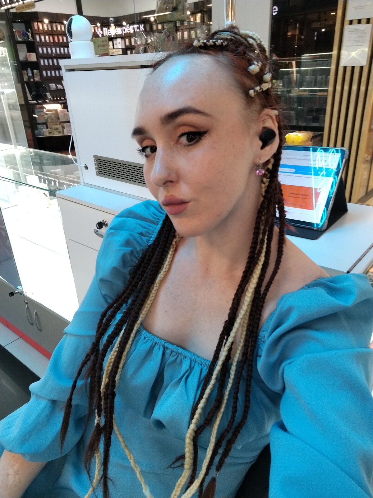 Woman photographed at retail establishment in Izhevsk, Russia